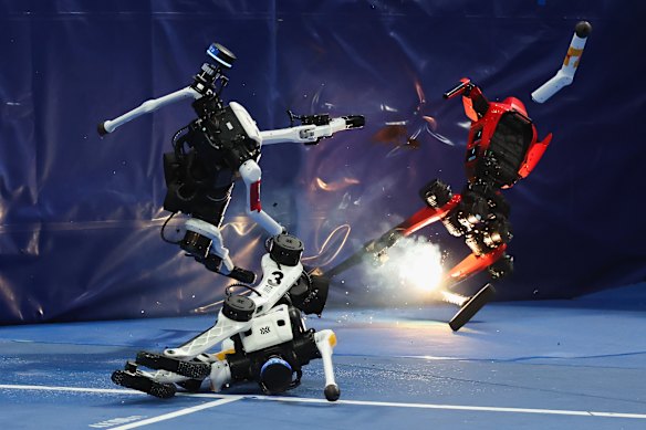 Humanoid robots collided with a wall and catch fire at the end of the 100-meter race during the 2nd World Humanoid Robot Games in Beijing, China.