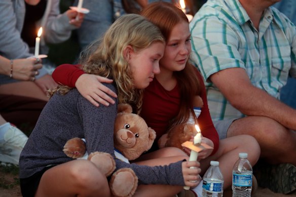 People gathered for a vigil on Wednesday night, after the shooting.