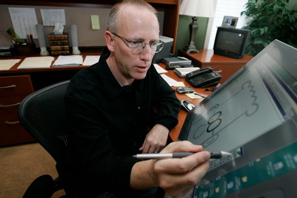 Scott Adams, creator of Dilbert, working on his comic strip in his studio in 2006.
