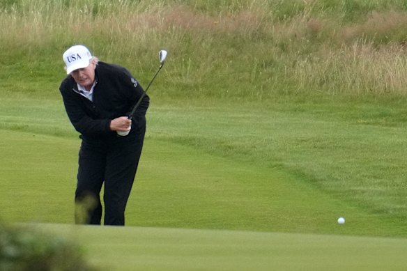 Donald Trump plays a round of golf at Turnberry on Sunday.