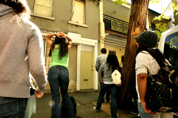 Prospective tenants wait to inspect a property in Chippendale.
