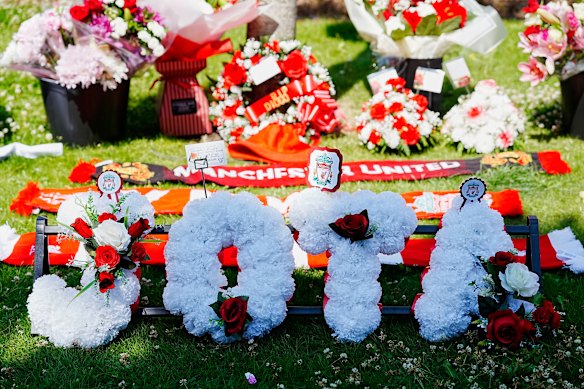 Floral tributes left by fans at Anfield Stadium.