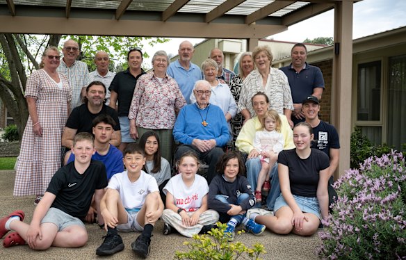 Reverend Bill Morgan at Cumberland View aged care home with his children, grandchildren and great-grandchildren.