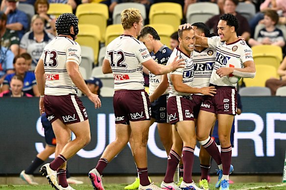 Hopoate celebrates after scoring a try.