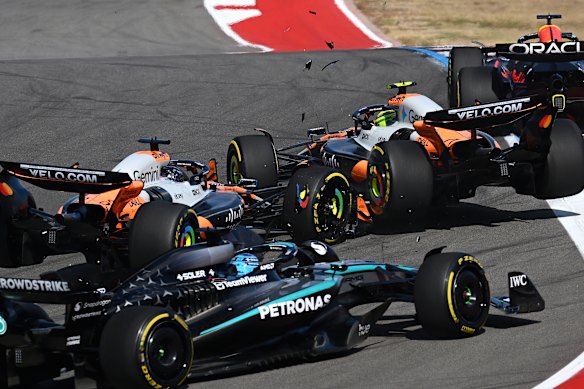 Oscar Piastri and Lando Norris collide.