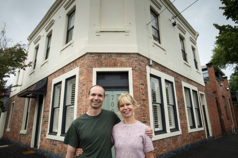 Tim and Fran Wilson after the auction of their side-by-side homes.