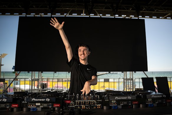 DJ Cooper Smith checking out the set-up for his gig at the Frankston Waterfront Festival. Cooper was born with cerebral palsy. 