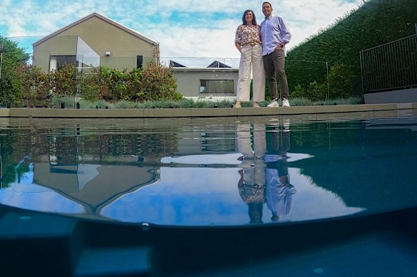Domenic and Belinda Minieri at their new pool in Mount Eliza. The suburb has the most pools of any suburb in Greater Melbourne.