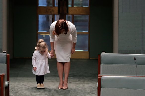 Anika Wells with daughter Celeste ahead of question time at Parliament House in Canberra in 2019. 