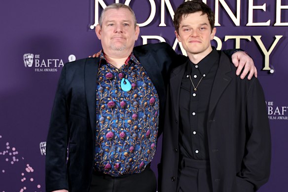 John Davidson (left) attended the BAFTAs to celebrate I Swear, a film inspired by his life, starring Robert Aramayo (right).