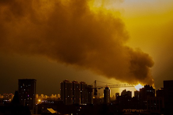 Fire rages in Kyiv during a Russian drone and missile attack.