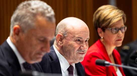 Defence Secretary Greg Moriarty (centre) appearing at senate estimates on Thursday. 