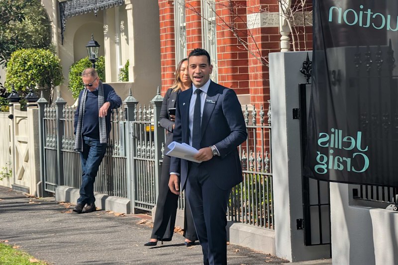 Max Mercuri runs the auction at 134 Richardson Street, Albert Park.