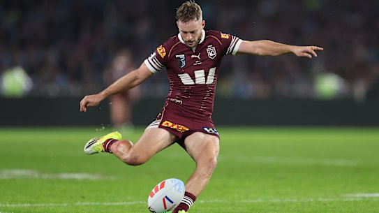 Sam Walker of the Maroons kicks a goal.