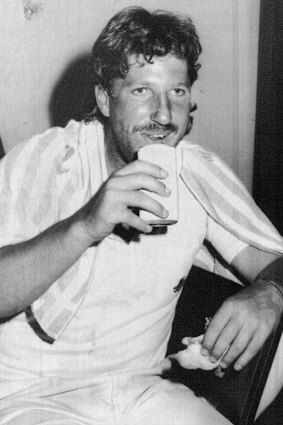 Ian Botham enjoys a cold drink after England’s win in the fourth Test at the MCG in 1982.