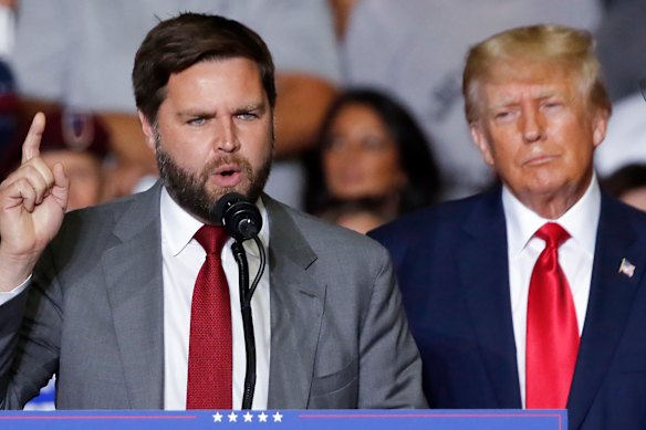JD Vance, then a Senate candidate, speaks alongside Donald Trump at a rally in 2022.