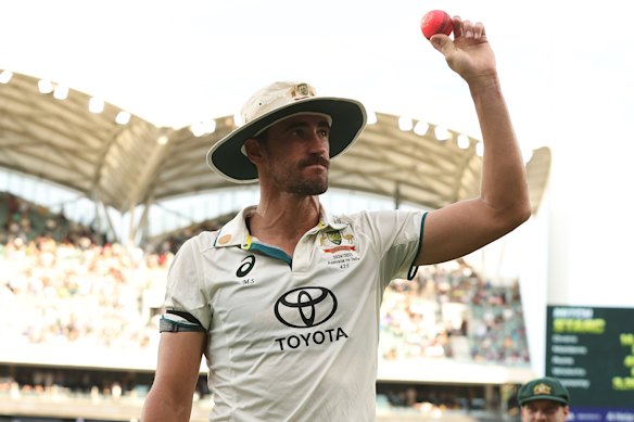 Mitchell Starc acknowledges the crowd at the Adelaide Oval in 2024. 