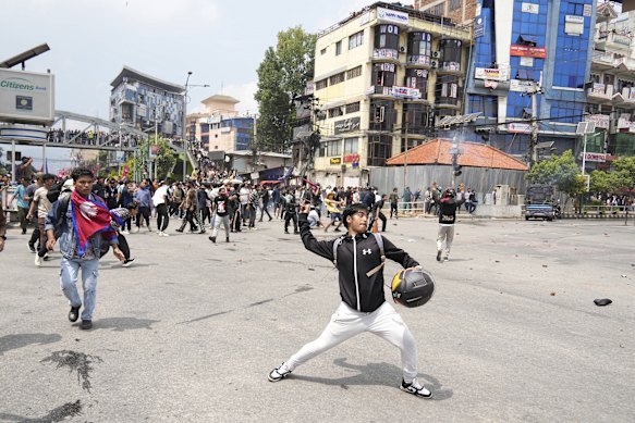 Protesters clash with riot police on Monday.