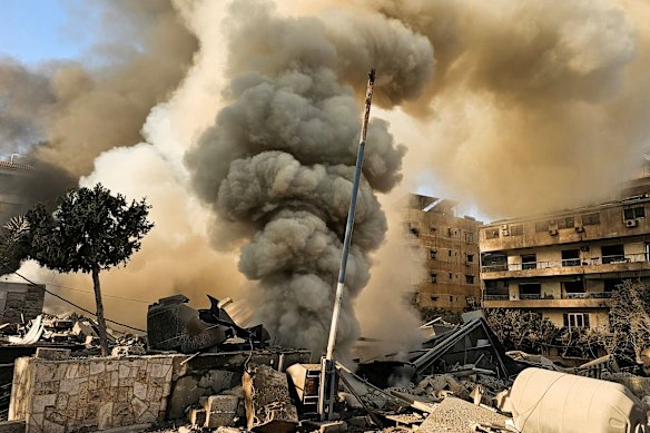 Smoke rises from the site of an Israeli airstrike on the southern suburbs of Beirut on March 3.