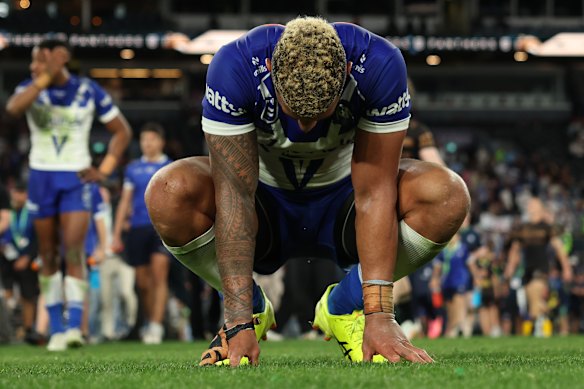 Viliame Kikau slumps to his knees after the defeat.