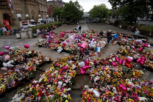 Tributes outside Southport Town Hall to the victims of Rudakubana’s attack. 