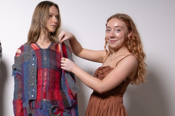 Winner of the Australian Fashion Foundation Scholarship Indigo Stuart with a model wearing her design.