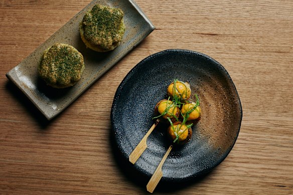 Snacks including dhokla (top left), steamed chickpea flour cakes, and grilled rice flour dumplings.