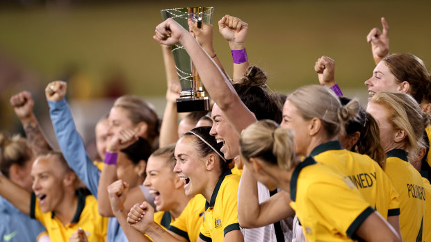 The Matildas lift the Cup of Nations trophy as they continue their preparations for the World Cup.