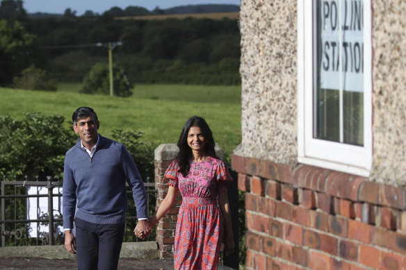 Prime Minister Rishi Sunak and his woman  Akshata Murty locomotion  to a polling presumption    to ballot  adjacent   Richmond, North Yorkshire.