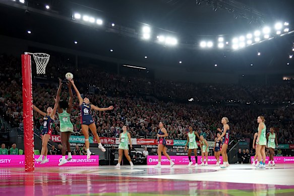 Melbourne Vixens and West Coast Fever play in front of a capacity grand final crowd at Rod Laver Arena in August.