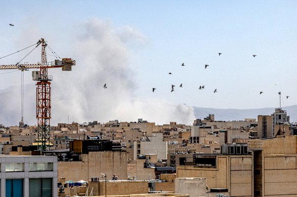 Smoke rises over Tehran on the first day of the war, which saw a string of decapitation strikes on Iran’s senior leadership.