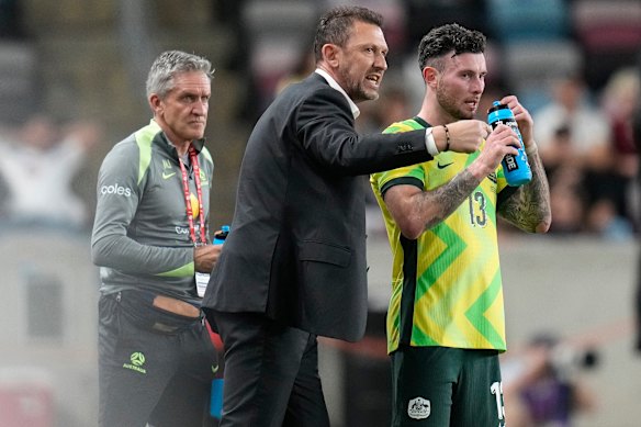 Tony Popovic gives Aiden O’Neill instructions.