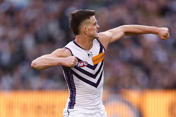 A fired-up Patrick Voss celebrates a key goal against Collingwood.