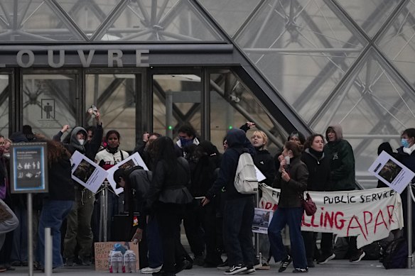Visitors were stopped from entering the world’s largest art museum on Monday after protesters set up outside the Louvre.