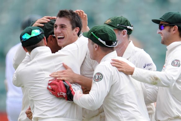 Pat Cummins and Australia celebrate a wicket in his debut against South Africa in 2011.