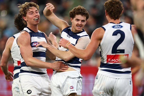 Geelong survived a furious charge from the Pies to win their MCG blockbuster.