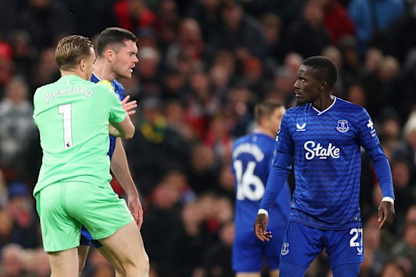 Michael Keane and Idriss Gueye argue during Everton’s clash with Manchester United..