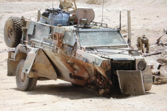 The Bushmaster damaged by an IED in Afghanistan in 2021. 