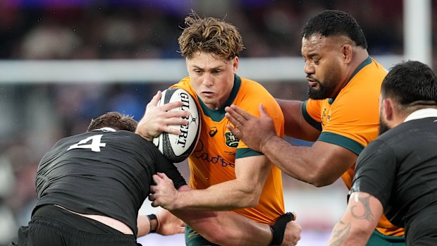 Australia’s James O’Connor takes on the All Blacks’ defence.