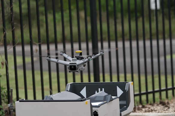 A drone emerges from its box.