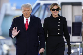 President Donald Trump and first lady Melania Trump arrive at Joint Base Andrews.