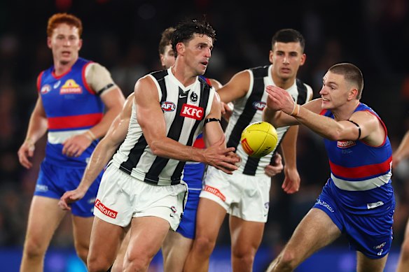 Playing on? Magpies coach Craig McRae is open to Scott Pendlebury lining up again in 2027.