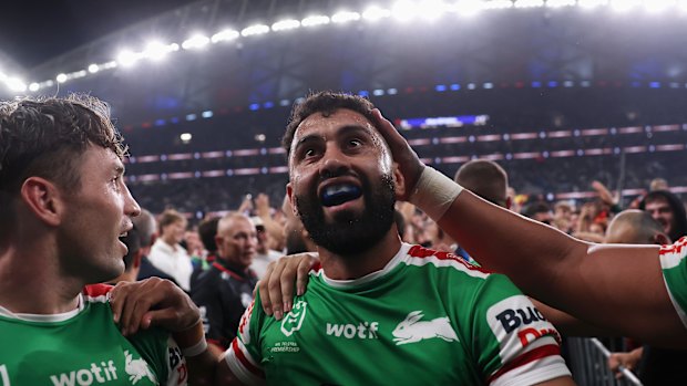 Alex Johnston is swamped by fans at Allianz Stadium.