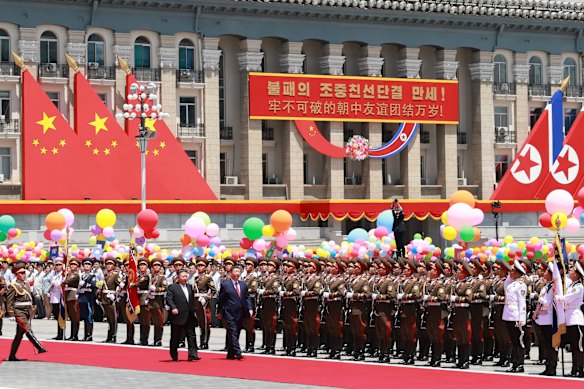 Xi was welcomed to Pyongyang with a military honour guard and throngs of cheering people, in photos captured by Chinese state media outlet Xinhua. 