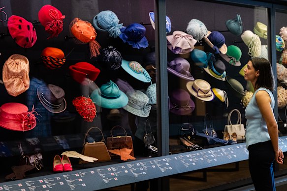 The Queen’s large hat collection is also part of the display at Buckingham Palace.