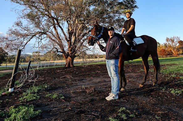 J.D. Hayes with track rider Patrick Didham and galloper Matchless at a regenerating Lindsay Park.