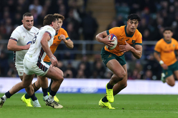 Joseph-Aukuso Suaalii on the charge for the Wallabies against England.