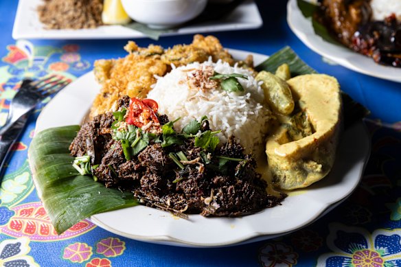 Build your own nasi campur plate from the selection in the bain-marie.