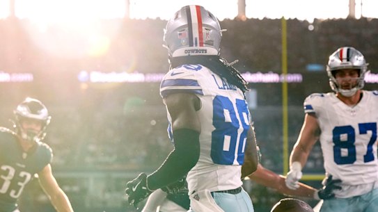 The sun streams in from the western end of AT&T Stadium during a clash between the Dallas Cowboys and Philadelphia Eagles.