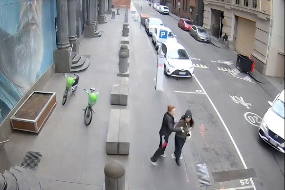 CCTV footage shows the moment a woman allegedly stabbed 36-year-old Wan Lai in Melbourne’s CBD.